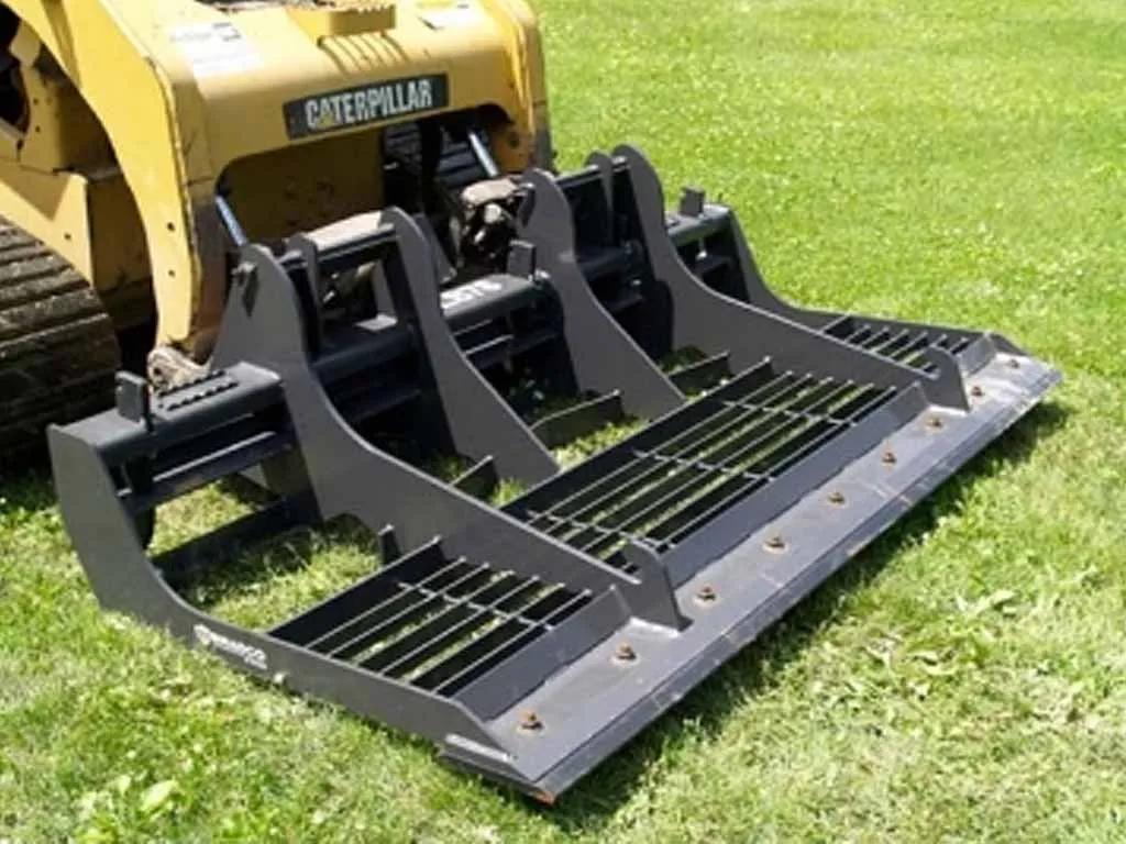 PALADIN / BRADCO land sculpture for machines with universal skid steer coupler